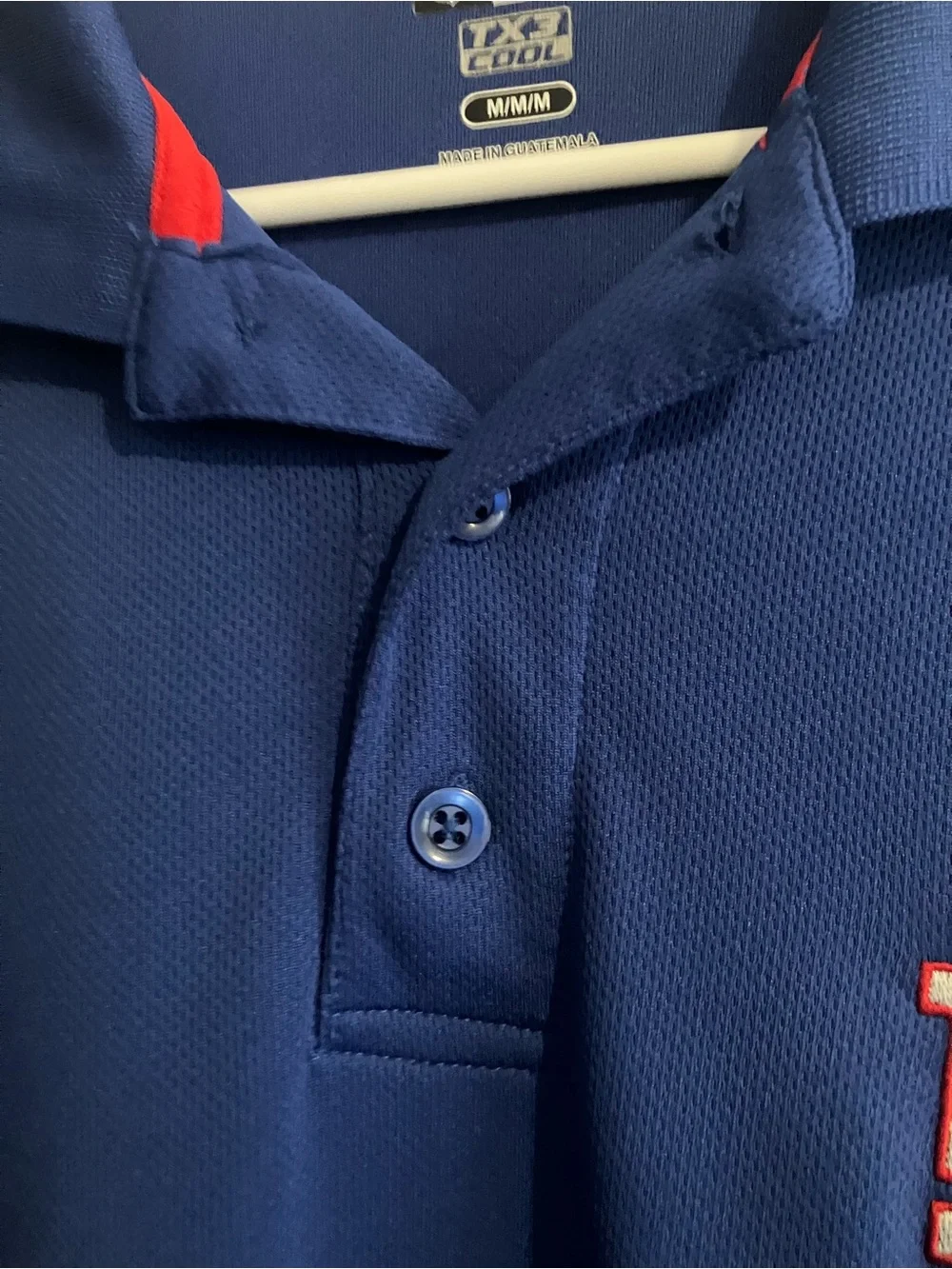 Youth New York Giant’s Royal Blue Polo with Red Side Panels Size M